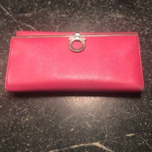 Gently used. 7 compartments for cards cash slots